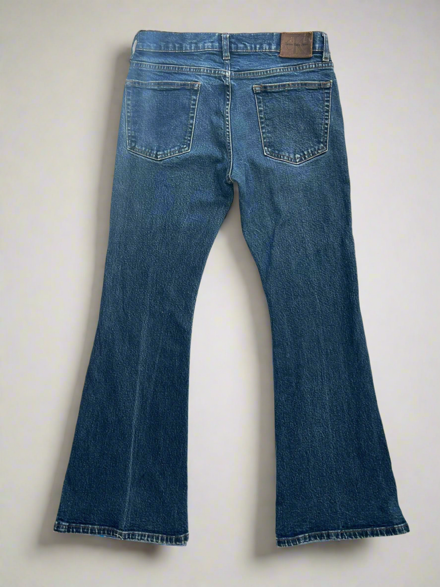 Dark Wash Denim Flares by Calvin Klein