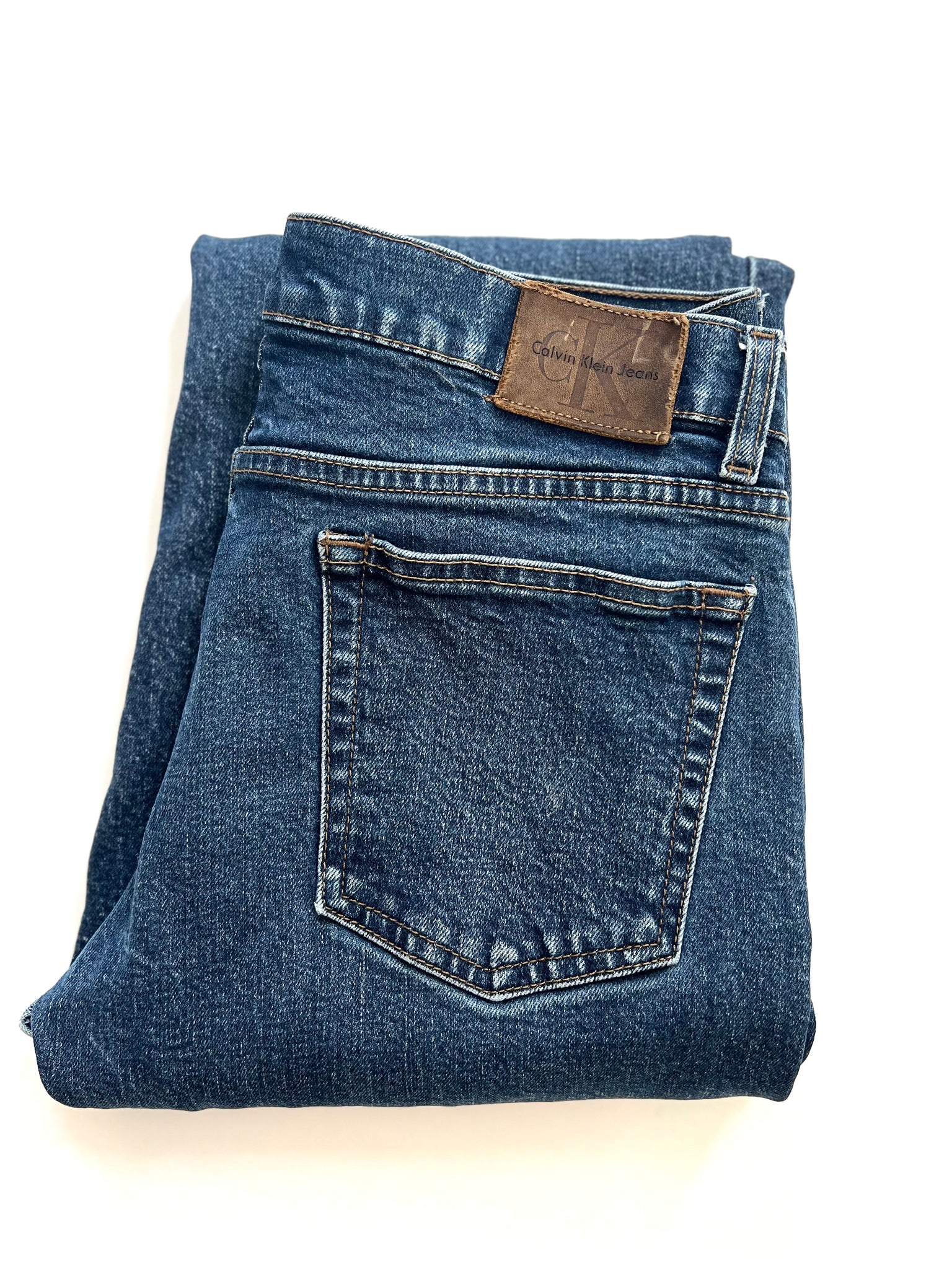 Dark Wash Denim Flares by Calvin Klein